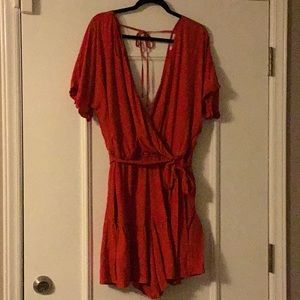 Flirty, comfy, red, ruffled romper.